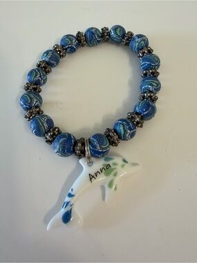 Blue Swirl Beaded stone Stretch Bracelet with Dolphin Charm ( can be removed)